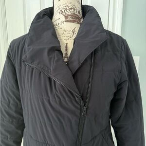 New Balance black heat jacket with asymmetrical zipper